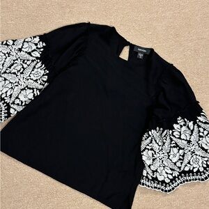 Karen Kane XS black top with white embroidered sleeves bell poofy
